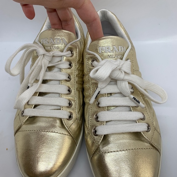 gold prada trainers